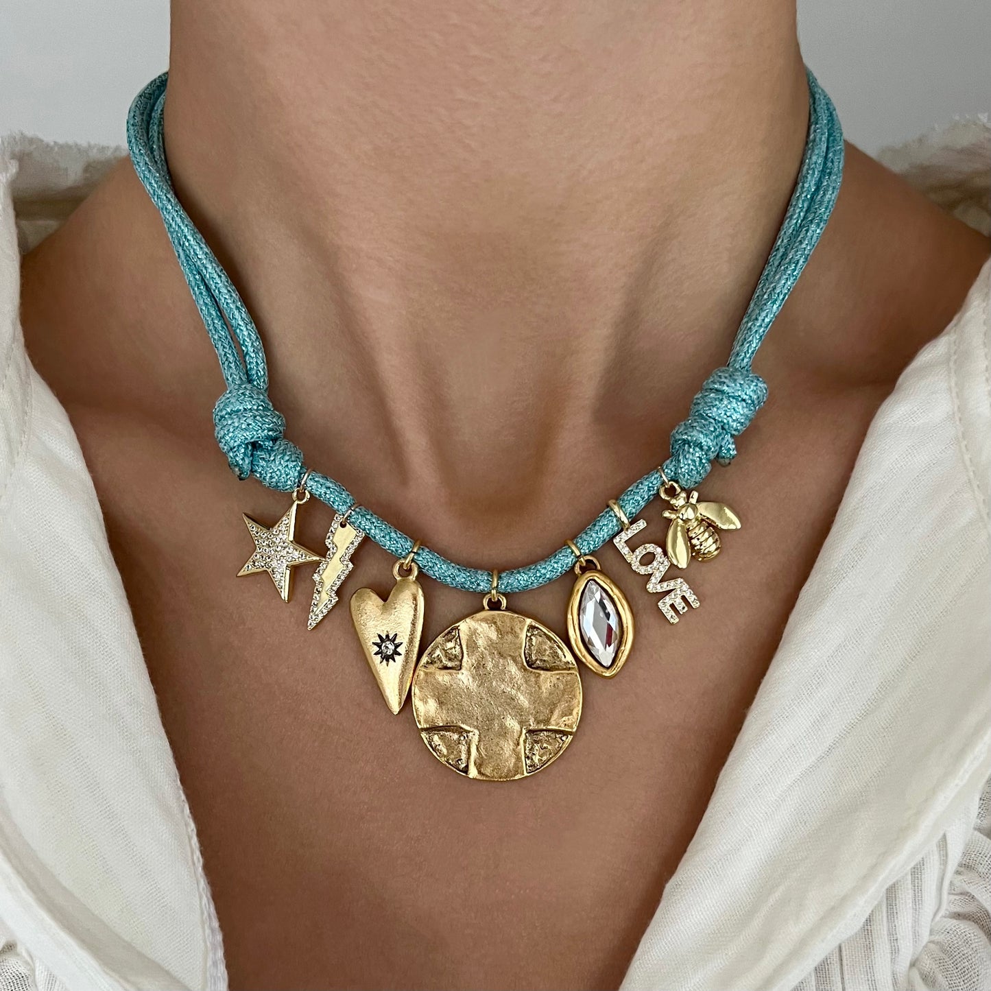 Big Cross Coin + baby blue glitter