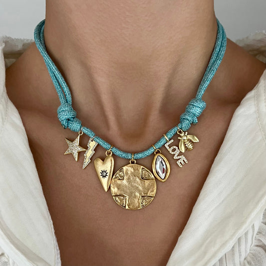 Big Cross Coin + baby blue glitter